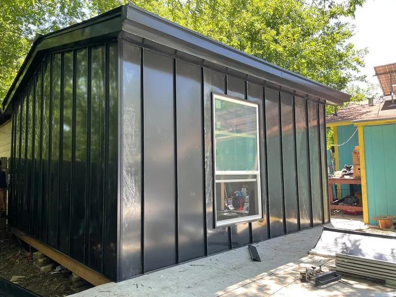 Black standing seam metal wall panels for Roof Inspection in Canton